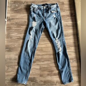 Hollister blue mid-rise super skinny jeans Size 27” W x 28”L distressed ripped